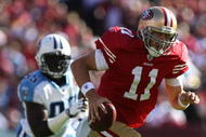 SAN FRANCISCO - NOVEMBER 08: Alex Smith #11 of the San Francisco 49ers runs against the Tennessee Titans during an NFL game on November 8, 2009 at Candlestick Park in San Francisco, California. (Photo by Jed Jacobsohn/Getty Images)