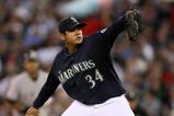 SEATTLE - SEPTEMBER 18:  Starting pitcher Felix Hernandez #34 of the Seattle Mariners pitches against the New York Yankees on September 18, 2009 at Safeco Field in Seattle, Washington. (Photo by Otto Greule Jr/Getty Images)