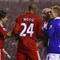 LIVERPOOL, ENGLAND - NOVEMBER 09:  David Ngog of Liverpool is confronted by Lee Carsley of Birmingham City after he won his side a penalty kick during the Barclays Premier League match between Liverpool and Birmingham City at Anfield on November 9, 2009 in Liverpool, England.  (Photo by Alex Livesey/Getty Images)