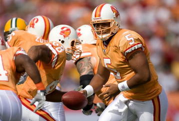 TAMPA, FL - NOVEMBER 08:  Quarterback Josh Freeman #5 of the Tampa Bay Buccaneers hands the ball off against the Green Bay Packers during the game at Raymond James Stadium on November 8, 2009 in Tampa, Florida.  (Photo by J. Meric/Getty Images)
