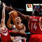 PORTLAND, OR - OCTOBER 27:  Brandon Roy #7 of the Portland Trail Blazers drives against Carl Landry #14 and David Andersen #13 of the Houston Rockets during the season opener on October 27, 2009 at the Rose Garden in Portland, Oregon. NOTE TO USER: User expressly acknowledges and agrees that, by downloading and or using this Photograph, user is consenting to the terms and conditions of the Getty Images License Agreement.  (Photo by Jonathan Ferrey/Getty Images)