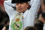 MADRID, SPAIN - NOVEMBER 10:  Real Madrid fan 'Tonin el Torero' reacts as he watches his team play during the Copa del Rey fourth round, second leg match between Real Madrid and AD Alcorcon at the Estadio Santiago Bernabeu on November 10, 2009 in Madrid, Spain. Real Madrid won the match 1-0 but got eliminated from the Copa del Rey by the third Division Spanish League team losing 4-1 on aggregate.  (Photo by Jasper Juinen/Getty Images)