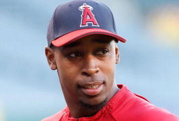 ANAHEIM, CA - OCTOBER 18:  Chone Figgins #9 of the Los Angeles Angels of Anaheim looks on during an off-day workout part of the ALCS during the 2009 MLB Playoffs at Angel Stadium of Anaheim on October 18, 2009 in Anaheim, California.  (Photo by Jeff Gross/Getty Images)