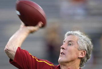TEMPE, AZ - NOVEMBER 07:  Head coach Pete Carroll of the USC Trojans throws a football before the college football game against the Arizona State Sun Devils at Sun Devil Stadium on November 7, 2009 in Tempe, Arizona.  The Trojans defeated the Devils 14-9.  (Photo by Christian Petersen/Getty Images)