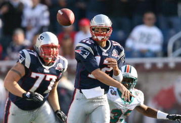 FOXBORO, MA - NOVEMBER 8:  Tom Brady #12 of the New England Patriots throws against the Miami Dolphins at Gillette Stadium on November 8, 2009 in Foxboro, Massachusetts.  (Photo by Jim Rogash/Getty Images)