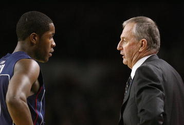 LOUISVILLE, KY - FEBRUARY 2:  Jerome Dyson #11 of the Connecticut Huskies listens to head coach Jim Calhoun during the Big East Conference game against the Louisville Cardinals on February 2, 2009 at Freedom Hall in Louisville, Kentucky.  (Photo by Andy Lyons/Getty Images)