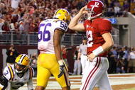 TUSCALOOSA, AL - NOVEMBER 07: Perry Riley #56 and Chad Jones #3 of the Louisiana State University Tigers react as quarterback Greg McElroy #12 of the Alabama Crimson Tide celebrates their two-point conversion at Bryant-Denny Stadium on November 7, 2009 in Tuscaloosa, Alabama. (Photo by Kevin C. Cox/Getty Images)