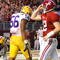 TUSCALOOSA, AL - NOVEMBER 07:  Perry Riley #56 and Chad Jones #3 of the Louisiana State University Tigers react as quarterback Greg McElroy #12 of the Alabama Crimson Tide celebrates their two-point conversion at Bryant-Denny Stadium on November 7, 2009 in Tuscaloosa, Alabama.  (Photo by Kevin C. Cox/Getty Images)