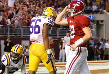 TUSCALOOSA, AL - NOVEMBER 07:  Perry Riley #56 and Chad Jones #3 of the Louisiana State University Tigers react as quarterback Greg McElroy #12 of the Alabama Crimson Tide celebrates their two-point conversion at Bryant-Denny Stadium on November 7, 2009 in Tuscaloosa, Alabama.  (Photo by Kevin C. Cox/Getty Images)