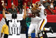 ATLANTA - NOVEMBER 08:  Todd Yoder #87 of the Washington Redskins celebrates his touchdown against the Atlanta Falcons with Fred Davis #86 at Georgia Dome on November 8, 2009 in Atlanta, Georgia.  (Photo by Kevin C. Cox/Getty Images)