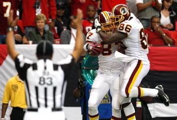 ATLANTA - NOVEMBER 08:  Todd Yoder #87 of the Washington Redskins celebrates his touchdown against the Atlanta Falcons with Fred Davis #86 at Georgia Dome on November 8, 2009 in Atlanta, Georgia.  (Photo by Kevin C. Cox/Getty Images)