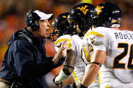 AUBURN, AL - SEPTEMBER 19: Head coach Bill Stewart of the West Virginia Mountaineers against the Auburn Tigers at Jordan-Hare Stadium on September 19, 2009 in Auburn, Alabama. (Photo by Kevin C. Cox/Getty Images)
