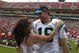 TAMPA, FL - DECEMBER 30: Quarterback Vinny Testaverde of the Carolina Panthers hugs his wife after play against the Tampa Bay Buccaneers at Raymond James Stadium on December 30, 2007 in Tampa, Florida. The Panthers won 31 - 23 and Testaverde announced his retirement. (Photo by Al Messerschmidt/Getty Images)