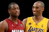 LOS ANGELES - FEBRUARY 28:   Dwayne Wade #3 of the Miami Heat and Kobe Bryant #24 of the Los Angeles Lakers talk during a break in the game on February 28, 2008 at Staples Center in Los Angeles, California.  The Lakers won 106-88. NOTE TO USER: User expressly acknowledges and agrees that, by downloading and/or using this Photograph, user is consenting to the terms and conditions of the Getty Images License Agreement. (Photo by Stephen Dunn/Getty Images)