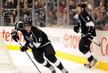 LOS ANGELES, CA - NOVEMBER 05:  Anze Kopitar #11 of the Los Angeles Kings starts a rush with Jack Johnson #3 against the Pittsburgh Penguins during the game at the Staples Center on November 5, 2009 in Los Angeles, California.  (Photo by Harry How/Getty Images)