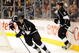 LOS ANGELES, CA - NOVEMBER 05:  Anze Kopitar #11 of the Los Angeles Kings starts a rush with Jack Johnson #3 against the Pittsburgh Penguins during the game at the Staples Center on November 5, 2009 in Los Angeles, California.  (Photo by Harry How/Getty Images)