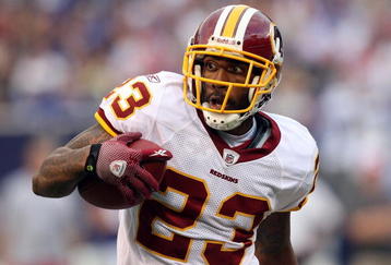 EAST RUTHERFORD, NJ - SEPTEMBER 13:  DeAngelo Hall #23 of the Washington Redskins runs the ball after an interception against the New York Giants on September 13, 2009 at Giants Stadium in East Rutherford, New Jersey.  (Photo by Jim McIsaac/Getty Images)