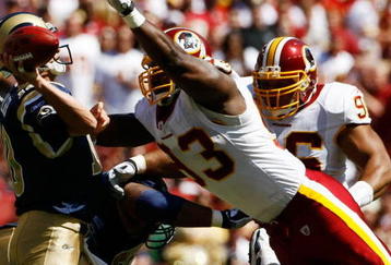 LANDOVER, MD - SEPTEMBER 20:  Mark Bulger #10 of the St. Louis Rams tries to avoid Phillip Daniels #92 of the Washington Redskins during their game on September 20, 2009 at FedEx Field in Landover, Maryland. (Photo by Win McNamee/Getty Images)
