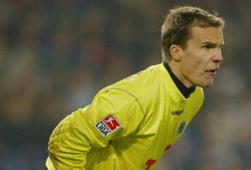 HANNOVER, GERMANY - OCTOBER 17:  Goalkeeper Robert Enke of Hannover 96 eyes the play from his position during their Bundesliga match against Vfl Wolfsburg on October 17, 2004 at AWD Arena in Hannover, Germany. Hannover won 3-0. (Photo by Victor Decolongon/Getty Images)