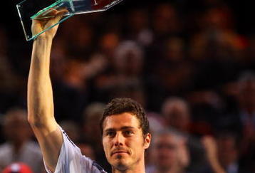 PARIS - NOVEMBER 11:  Marit Safin of Russia holds aloft his award after playing his final competitive match against Juan Martin Del Potro of Argentina during the ATP Masters Series at the Palais Omnisports De Paris-Bercy on November 11, 2009 in Paris, France.  (Photo by Clive Rose/Getty Images)