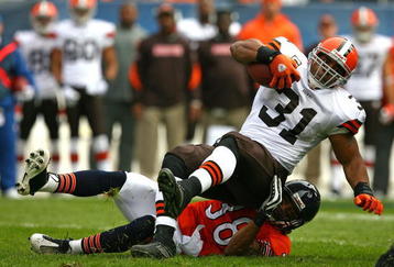 CHICAGO - NOVEMBER 01: Danieal Manning #38 of the Chicago Bears takes down Jamal Lewis #31 of the Cleveland Browns at Soldier Field on November 1, 2009 in Chicago, Illinois. The Bears defeated the Browns 30-6. (Photo by Jonathan Daniel/Getty Images)