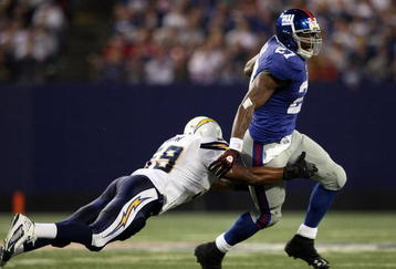 EAST RUTHERFORD, NJ - NOVEMBER 8:  Brandon Jacobs #27 of the New York Giants runs the ball against the San Diego Chargers at Giants Stadium on November 8, 2009 in East Rutherford, New Jersey. The Chargers defeated the Giants 21-20.  (Photo by Nick Laham/Getty Images)