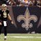 NEW ORLEANS - NOVEMBER 08:  Quarterback Drew Brees #9 of the New Orleans Saints at Louisiana Superdome on November 8, 2009 in New Orleans, Louisiana.  (Photo by Ronald Martinez/Getty Images)