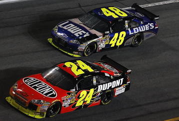 DAYTONA BEACH, FL - FEBRUARY 07: Jeff Gordon, driver of the #24 DuPont Chevrolet, races Jimmie Johnson, driver of the #48 Lowe's Chevrolet during the NASCAR Sprint Cup Series Budweiser Shootout at Daytona International Speedway on February 7, 2009 in Daytona Beach, Florida.  (Photo by Jason Smith/Getty Images for NASCAR)