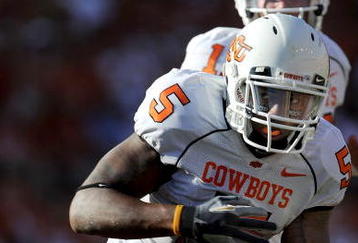 AUSTIN, TX - OCTOBER 25:  Running back Keith Toston #5 of the Oklahoma State Cowboys runs for a touchdown against the Texas Longhorns at Texas Memorial Stadium on October 25, 2008 in Austin, Texas.  (Photo by Ronald Martinez/Getty Images)