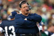 SOUTH BEND, IN - OCTOBER 03: Head coach Charlie Weis of the Notre Dame Fighting Irish watches as his team takes on the Washington Huskies on October 3, 2009 at Notre Dame Stadium in South Bend, Indiana.  Notre Dame defeated Washington 37-30 in overtime.  (Photo by Jonathan Daniel/Getty Images)