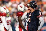 CHICAGO - NOVEMBER 08: Jay Cutler #6 of the Chicago Bears waits for the play call during a game against the Arizona Cardinals at Soldier Field on November 8, 2009 in Chicago, Illinois. The Cardinals defeated the Bears 41-21. (Photo by Jonathan Daniel/Getty Images)