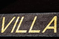 BIRMINGHAM, UNITED KINGDOM - JANUARY 31:  The winter Sun reflects off the word 'Villa' high above the exterior of Villa Park prior to the Barclays Premier League match between Aston Villa and Wigan Athletic at Villa Park on January 31, 2009 in Birmingham, England.  (Photo by Mike Hewitt/Getty Images)