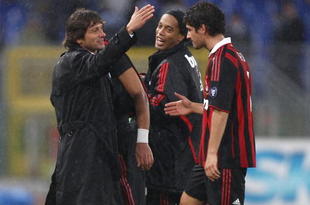 ROME - NOVEMBER 08:  Leonardo (L) the coach of Milan, Pato (R) and Ronaldinho celebrate the victory  after the Serie A match between SS Lazio and AC Milan at Stadio Olimpico on November 8, 2009 in Rome, Italy.  (Photo by Paolo Bruno/Getty Images)
