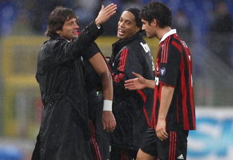ROME - NOVEMBER 08:  Leonardo (L) the coach of Milan, Pato (R) and Ronaldinho celebrate the victory  after the Serie A match between SS Lazio and AC Milan at Stadio Olimpico on November 8, 2009 in Rome, Italy.  (Photo by Paolo Bruno/Getty Images)