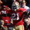 SAN FRANCISCO - NOVEMBER 08: Frank Gore #21 of the San Francisco 49ers celebrates after scoring a touchdown against the Tennessee Titans during an NFL game on November 8, 2009 at Candlestick Park in San Francisco, California.  (Photo by Jed Jacobsohn/Getty Images)