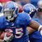 LAWRENCE, KS - OCTOBER 10:  Toben Opurum #35 of the Kansas Jayhawks runs with the ball during the game against the Iowa State Cyclones on October 10, 2009 at Memorial Stadium in Lawrence, Kansas. (Photo by Jamie Squire/Getty Images)