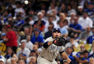 LOS ANGELES, CA - SEPTEMBER 04:  Adrian Gonzalez #23 of the San Diego Padres catches a ball at first against the Los Angeles Dodgers on September 4, 2009 at Dodger Stadium in Los Angeles, California. (Photo by Jacob de Golish/Getty Images)