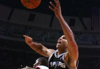 CHICAGO - OCTOBER 29: Richard Jefferson #24 of the San Antonio Spurs knocks a loose ball out of bounds past Tyrus Thomas #24 of the Chicago Bulls at the United Center on October 29, 2009 in Chicago, Illinois. NOTE TO USER: User expressly acknowledges and agrees that, by downloading and/or using this Photograph, user is consenting to the terms and conditions of the Getty Images License Agreement. (Photo by Jonathan Daniel/Getty Images)