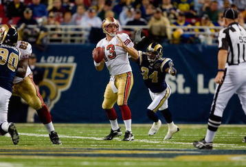 ST. LOUIS, MO - DECEMBER 21:  Fakhir Brown #34 of the St. Louis Rams bears down upon an unsuspecting Shaun Hill #13 of the San Francisco 49ers during the game at the Edward Jones Dome on December 21, 2008 in St. Louis, Missouri. The 49ers won 17-16. (Photo by Dilip Vishwanat/Getty Images) 