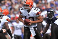 BALTIMORE - SEPTEMBER 27: Brady Quinn #10 of the Cleveland Browns hands off during the game against the Baltimore Ravens at M&T Bank Stadium on September 27, 2009 in Baltimore, Maryland. The Ravens defeated the Browns 34-3. (Photo by Larry French/Getty Images)