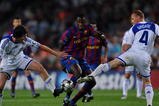 BARCELONA, SPAIN - SEPTEMBER 29:  Yaya Toure (C) of Barcelona duels for the ball with Artem Milevskiy (L) and Tiberiu Ghioane of Dynamo Kiev during the Champions League group F match between Barcelona and Dynamo Kiev at the Camp Nou Stadium on September 29, 2009 in Barcelona, Spain.  (Photo by Jasper Juinen/Getty Images)