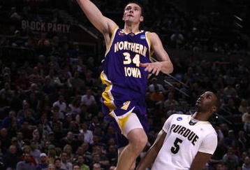 PORTLAND, OR - MARCH 19:  Adam Koch #34 of the Northern Iowa Panthers goes up for a dunk in front of Keaton Grant #5 of the Purdue Boilermakers in the second half during the first round of the NCAA Division I Men's Basketball Tournament at the Rose Garden on March 19, 2009 in Portland, Oregon. The Boilermakers defeated the Panthers 61-56.  (Photo by Jonathan Ferrey/Getty Images)