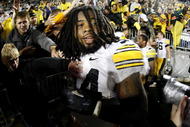 STATE COLLEGE, PA - SEPTEMBER 26:  Adrian Clayborn #94 of the Iowa Hawkeyes celebrates a 21-10 victory over the Penn State Nittnay Lions on September 26, 2009 at Beaver Stadium in State College, Pennsylvania.  (Photo by Gregory Shamus/Getty Images)