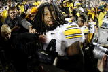 STATE COLLEGE, PA - SEPTEMBER 26:  Adrian Clayborn #94 of the Iowa Hawkeyes celebrates a 21-10 victory over the Penn State Nittnay Lions on September 26, 2009 at Beaver Stadium in State College, Pennsylvania.  (Photo by Gregory Shamus/Getty Images)