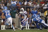 CANTON, OH - AUGUST 9: Roscoe Parrish #11 of the Buffalo Bills looks for running room after catching a pass against the Tennessee Titans during the Pro Football Hall of Fame Game at Fawcett Stadium on August 9, 2009 in Canton, Ohio. The Titans defeated the Bills 21-18. (Photo by Joe Robbins/Getty Images)