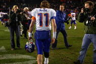 SAN DIEGO, CA - DECEMBER 23:  Quarterback Kellen Moore #11 of the Boise State Broncos walks off the field after his team's 17-16 loss to the TCU Horned Frogs during the San Diego County Credit Union Poinsettia Bowl at Qualcomm Stadium on December 23, 2008 in San Diego, California. (Photo by Donald Miralle/Getty Images)