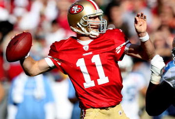 SAN FRANCISCO - NOVEMBER 08:  Alex Smith #11 of the San Francisco 49ers passes against the Tennessee Titans during an NFL game on November 8, 2009 at Candlestick Park in San Francisco, California.  (Photo by Jed Jacobsohn/Getty Images)