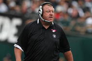OAKLAND, CA - OCTOBER 18:  Head coach Tom Cable of the Oakland Raiders looks on against the Philadelphia Eagles during an NFL game at the Oakland-Alameda County Coliseum on October 18, 2009 in Oakland, California.  (Photo by Jed Jacobsohn/Getty Images)