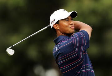 MELBOURNE, AUSTRALIA - NOVEMBER 12:  Tiger Woods of the USA plays an approach shot on the 18th hole during round one of the 2009 Australian Masters at Kingston Heath Golf Club on November 12, 2009 in Melbourne, Australia.  (Photo by Mark Dadswell/Getty Images)