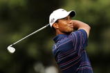 MELBOURNE, AUSTRALIA - NOVEMBER 12:  Tiger Woods of the USA plays an approach shot on the 18th hole during round one of the 2009 Australian Masters at Kingston Heath Golf Club on November 12, 2009 in Melbourne, Australia.  (Photo by Mark Dadswell/Getty Images)